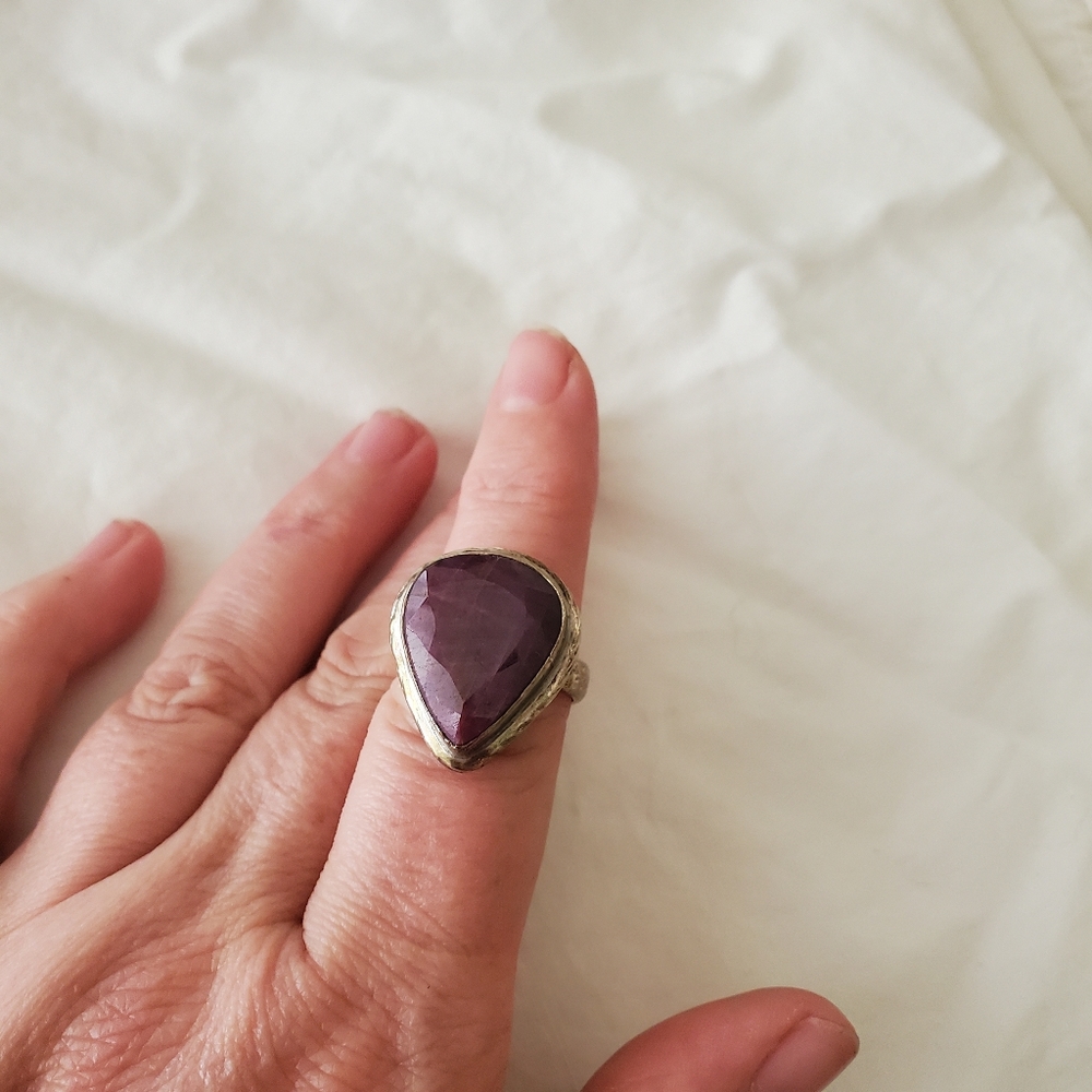 Redish purple stone in silver ring
